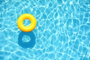 reduce pool maintenance with PowerLock Solar Safety Cover seals water in over 95% of the evaporation