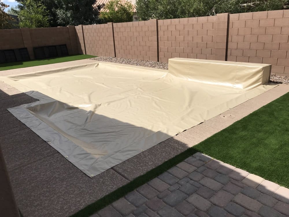Tan Power Lock Pool Cover In Rectangle With Raised Wall